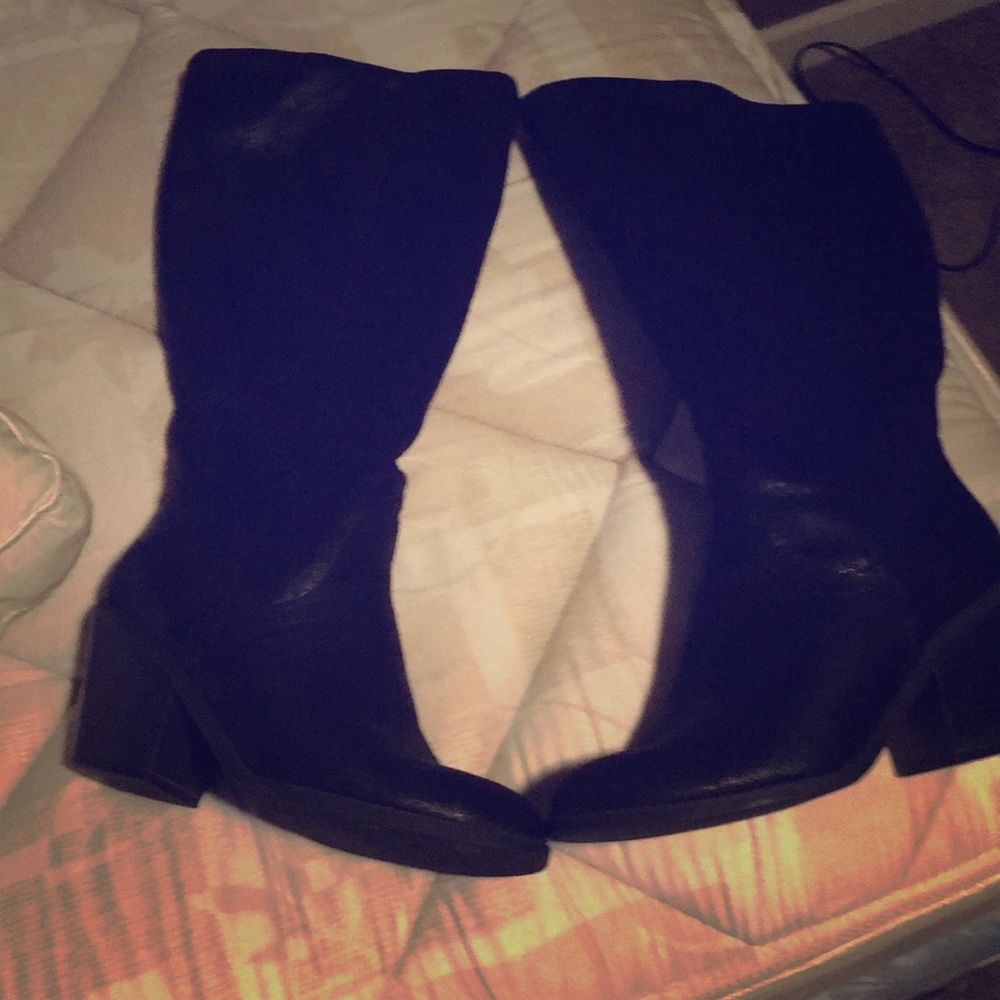Knee high black heel boots